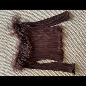 Chocolate brown polyester crimp-pleated off the shoulder top with feather trim